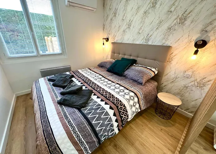 Апартаменты De Prestige Jardin Privatif Parking